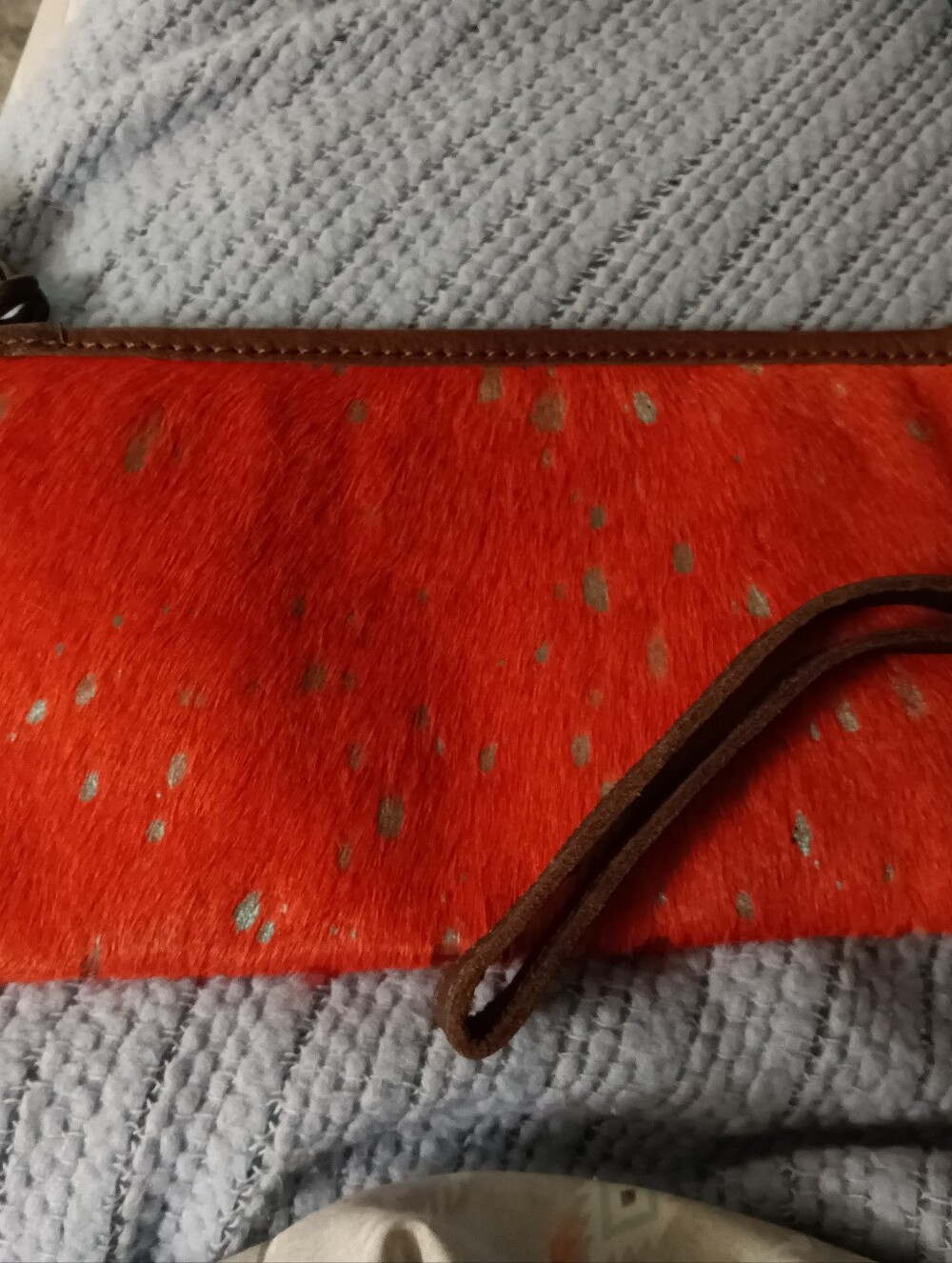 American Darling Bright Orange Haircalf Wristlet with Brown Leather Trim
